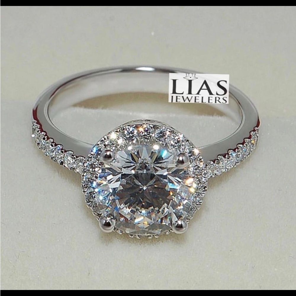 New 18k white gold engagement ring